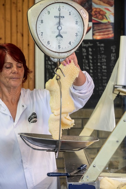 employee weighing out tripe portion