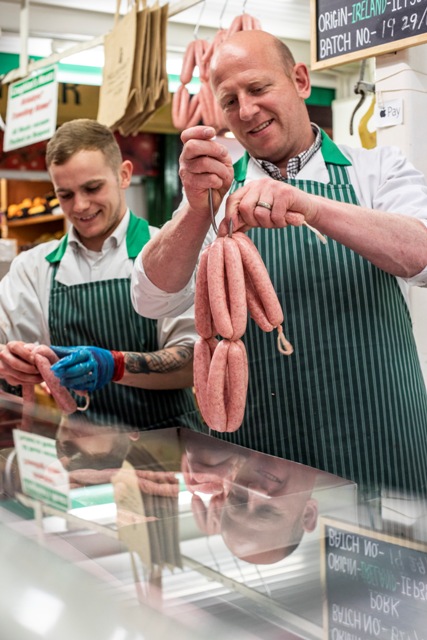 Employing prepping sausage links
