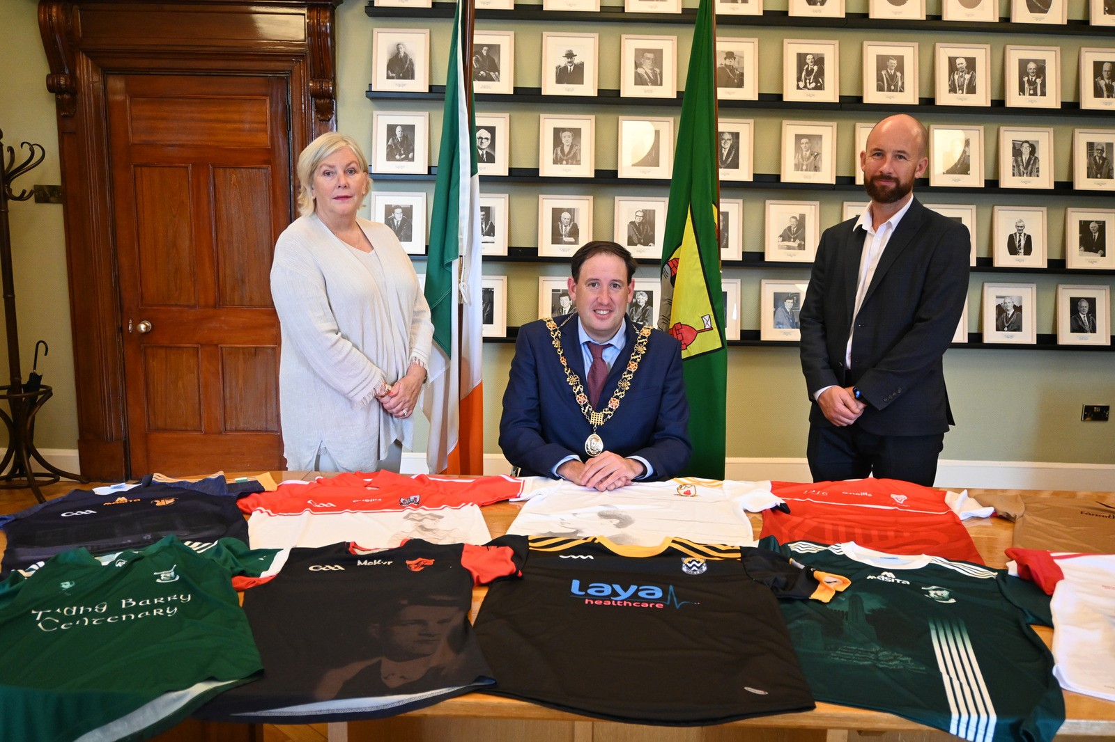 The Lord Mayor, Cllr. Kieran McCarthy, Chief Executive Ann Doherty, and Kevin O'Donovan of Cork GAA at the pre-launch of the commemorative jersey exhibition