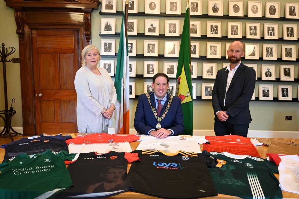 The Lord Mayor, Cllr. Kieran McCarthy, Chief Executive Ann Doherty, and Kevin O'Donovan of Cork GAA at the pre-launch of the commemorative jersey exhibition