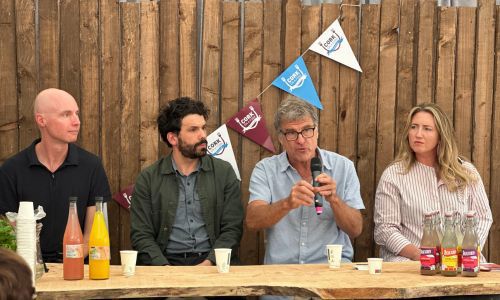Four people at the table discussing